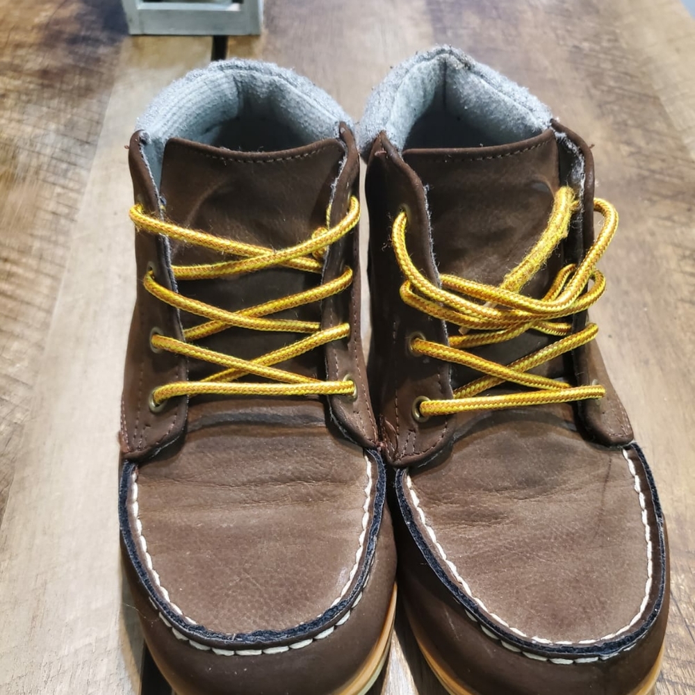 Children place shoes